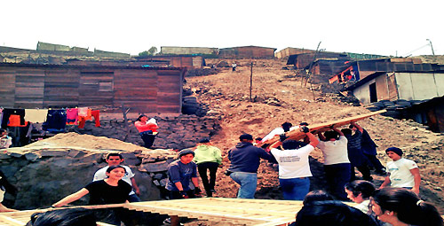  Augustinian high schoolers building houses for the poor near Lima. Peru