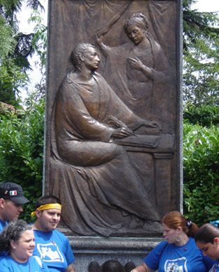 Bas relief of Augustine and Monica in the park